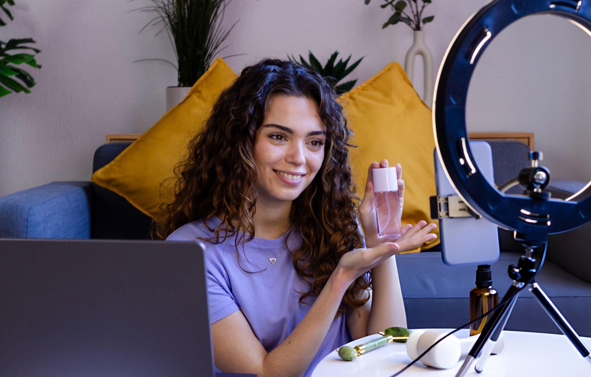 Affiliate creator with ring light at home