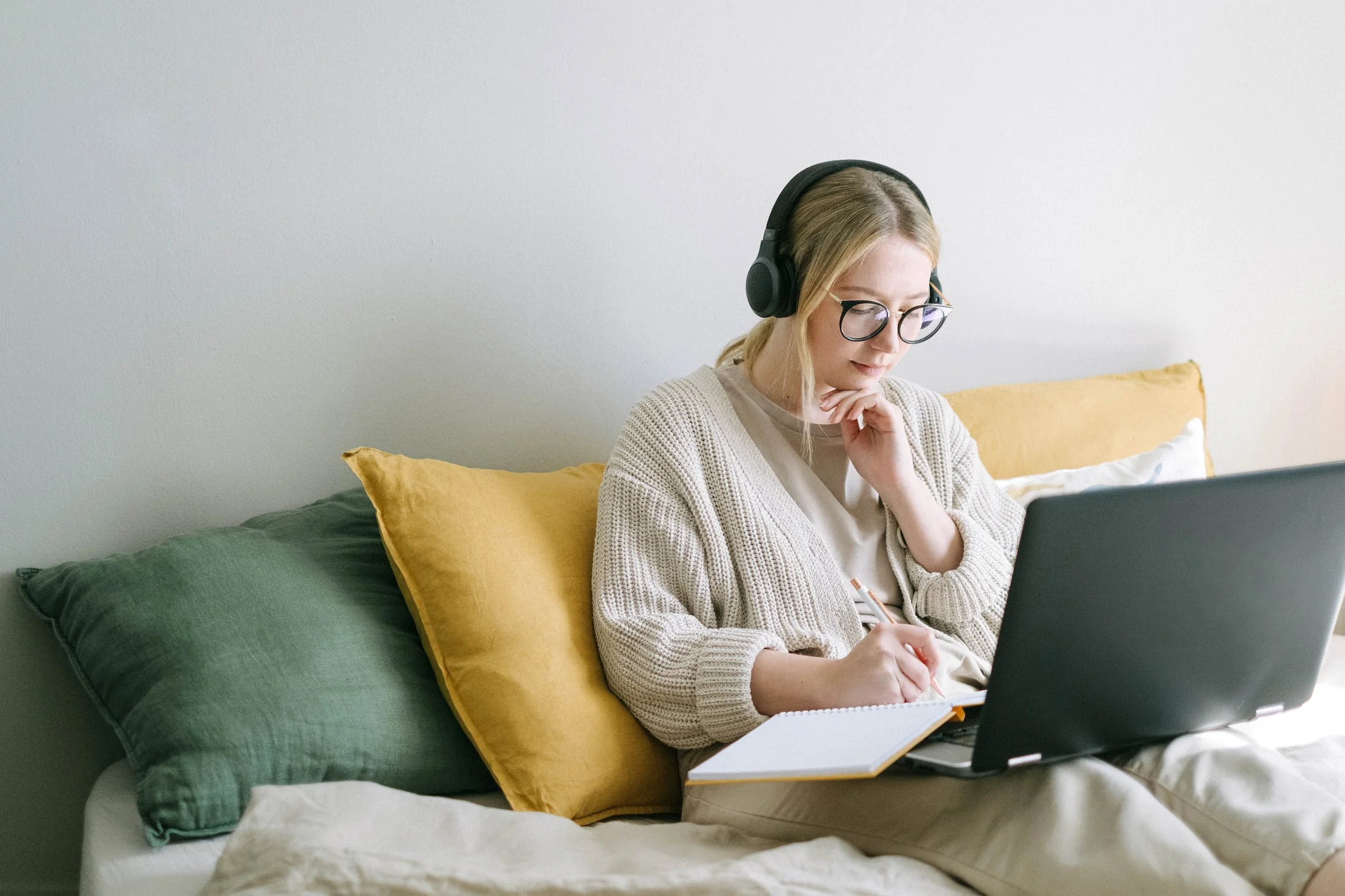A picture of a girl and her laptop